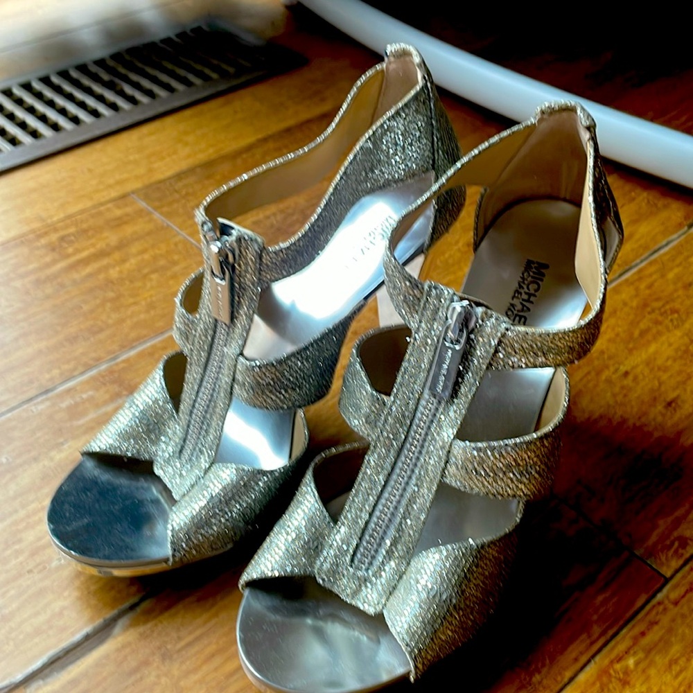 Michael Kors size 7 silver heels. Never worn